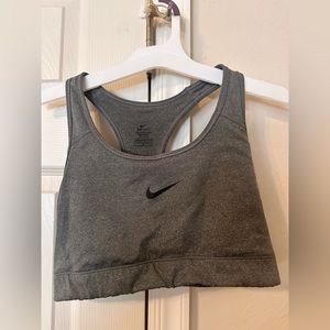 Nike Women’s dri-fit sports bra. Gray with black check. Size L